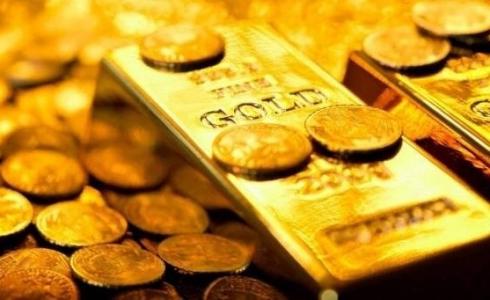 تراجع الذهب بسبب صعود الدولار ، ومخاوف رفع اسعار الفائدة