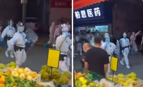 القوات الصينية تجبر السكان على إغلاق المحال التجارية خوفا من كورونا