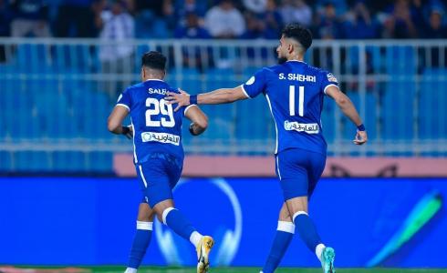 لاعبا نادي الهلال ضد الفيحاء