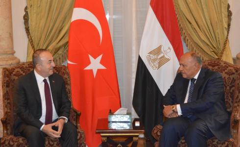 وزير الخارجية المصري شكري ونظيره التركي اوغلو