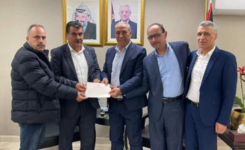 خلال تقديم المنحة القطرية لأهالي بلدة حوارة