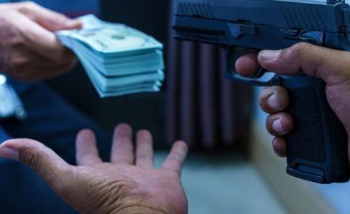 سطو مسلح على بنك  - توضيحية