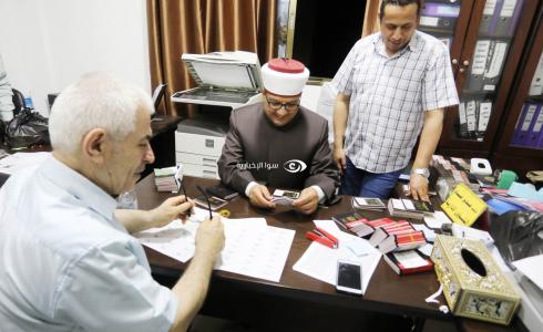 الوزير البكري يتفقّد إجراءات جمع جوازات سفر حجاج قطاع غزة