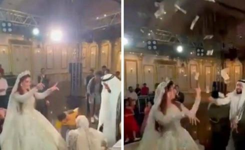 قصة فيديو سعودي يرشّ النقود على عروسه المصرية