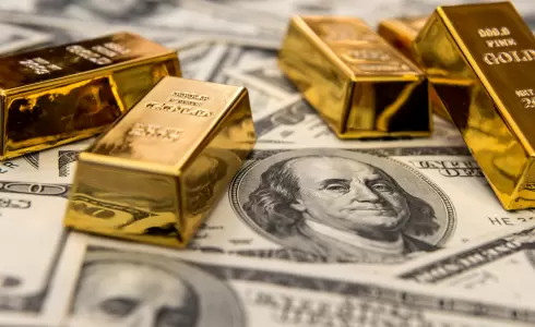 الدولار والذهب - تعبيرية