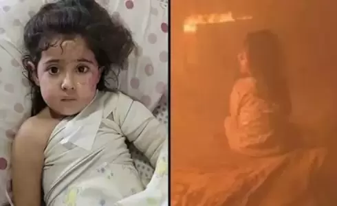 الطفلة التي كانت محاصرة وسط لهيب النيران جراء القصف الإسرائيلي على بيتهم في غزة
