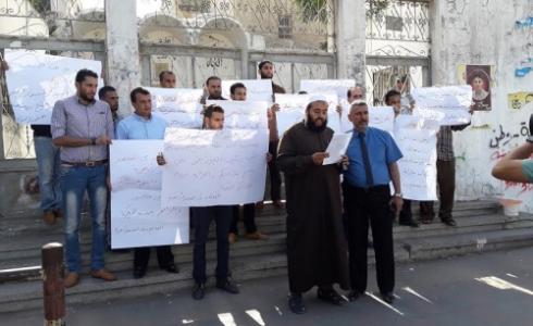 جانب من وقفة سابقة للعاملين في المعاهد الأزهرية بغزة
