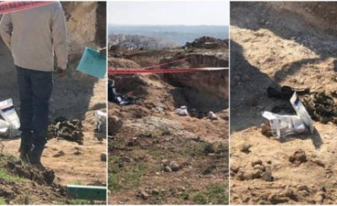 اسنخراج رفات شهيدين