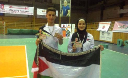 اللاعبان الفلسطينيان إسلام أبو عمّاش وحلا القاضي