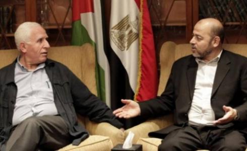 موسى أبو مرزوق وعزام الأحمد
