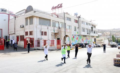 مناورة تدريبية للدفاع المدني في مصنع كوكاكولا برام الله