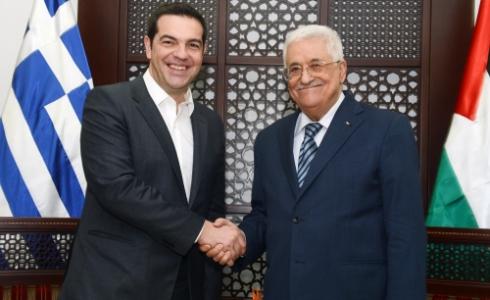 الرئيس عباس أثناء لقاء رئيس الوزراء اليوناني