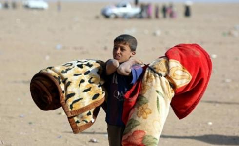 طفل هارب من الموصل