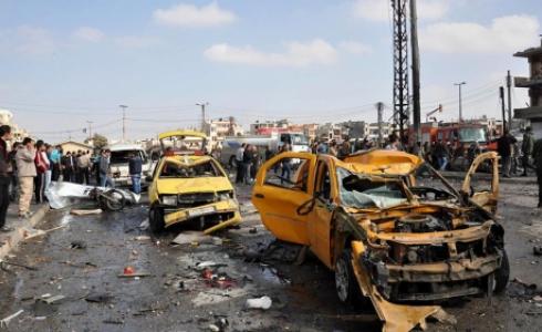 جانب من آثار تفجير سابق في مدينة حمص.