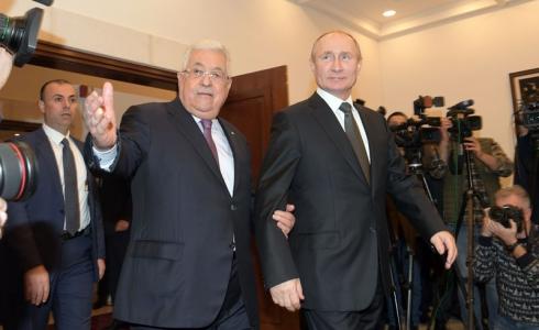 الرئيس محمود عباس ونظيره الروسي فلاديمير بوتين