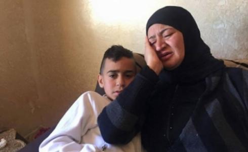 فلسطينية تودع ابنها الشهيد بالضفة