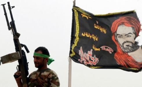 احد مسلحي "الحشد الشعبي" في الانبار