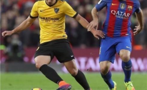 من مباراة برشلونة ومالاجا