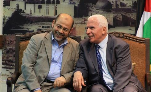 القيادي في حماس موسى أبو مرزوق والقيادي في فتح عزام الأحمد -ارشيف-