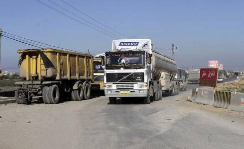 شاحنات بمحملة بالبضائع تدخل غزة عبر معبر كرم أبو سالم- توضيحية