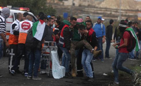 اصابات فلسطينيين في الضفة الغربية" ارشيف"