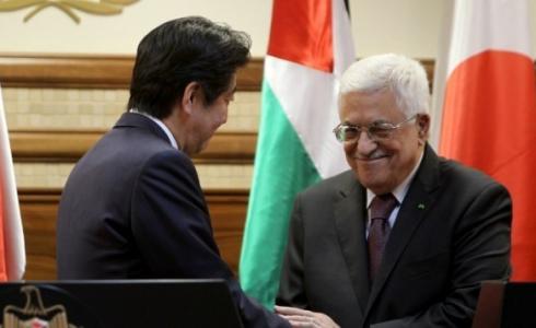 جانب من لقاء الرئيس محمود عباس مع رئيس الوزراء الياباني