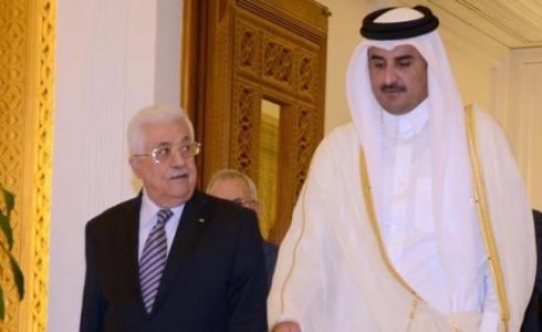 الرئيس محمود عباس وأمير قطر -ارشيف-