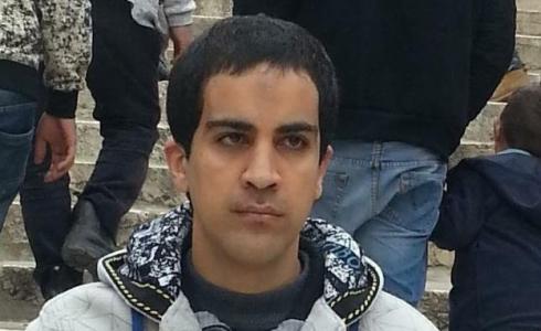 الشهيد من ذوي الاحتياجات الخاصة إياد الحلاق