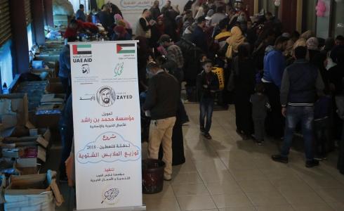 مؤسسة فارس العرب توزع ملابس شتوية لاطفال غزة