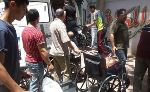 توزيع مساعدات على المعاقين