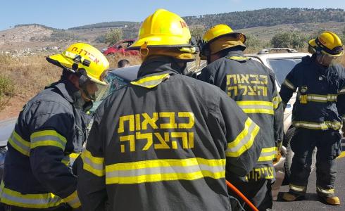 مع سلطات الإطفاء والإنقاذ  - ارشيفية -