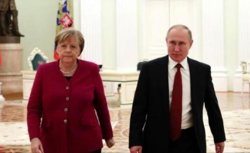 بوتن وميركل