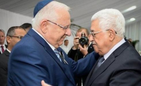 الرئيس الفلسطيني محمود عباس والإسرائيلي رؤوفين ريفلين -ارشيف-