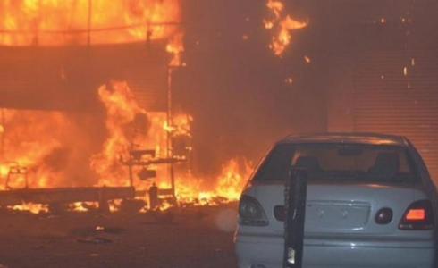 شاب كويتي يحاول حرق والدته