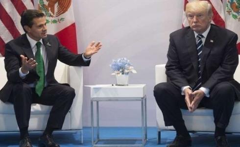 رئيسا الولايات المتحدة والمكسيك خلال لقائهما على هامش قمة العشرين في هامبورغ - 7 يوليو 2017