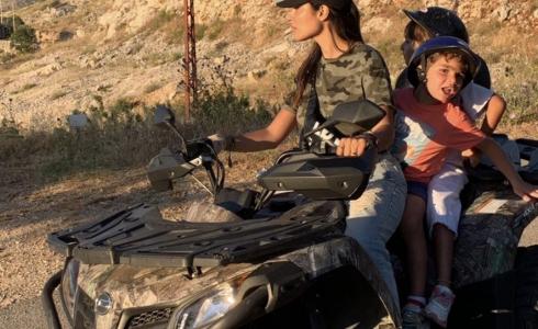 في ظل كورونا نادين نجيم تستمتع بجمال الطبيعة مع عائلتها