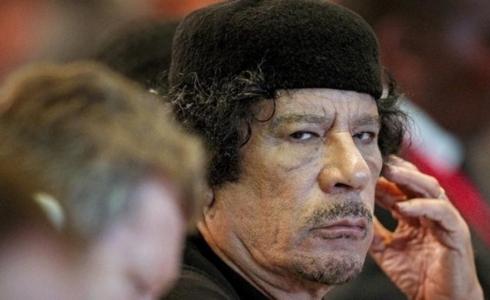 الرئيس الليبي الراحل معمر القذافي