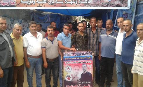 وفد قيادي من الجبهة الديمقراطية يزورون الأسير المحرر رافد النباهين