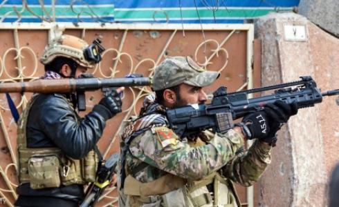 أفراد من القوات العراقية يشاركون في عملية استعادة الموصل - 13 يناير 2017.