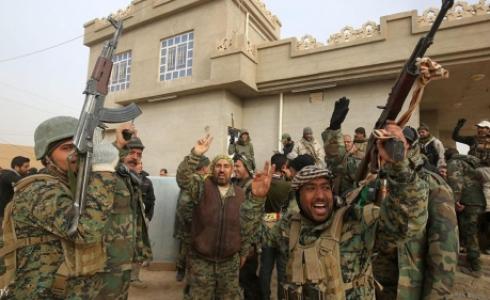 مسلحون من الحشد الشعبي في العراق