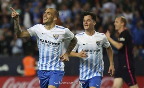 ملقا وبرشلونة