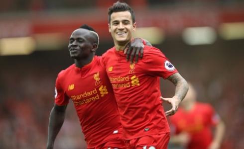 ساديو ماني مع زميله كوتينهو