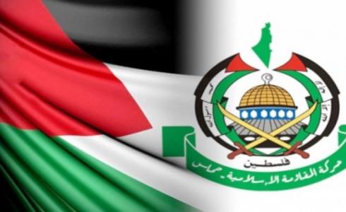 شعار حركة "حماس" وعلم فلسطين -تعبيرية-