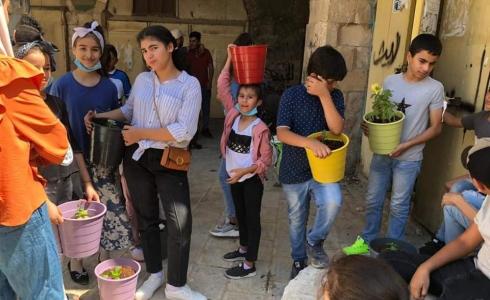 فعالية كوم حجار و باقة أزهار للحفاظ على الإرث الثقافي في جنين