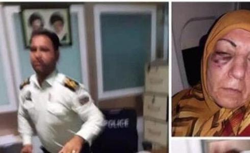 مسنة عراقية تتعرض للضرب على يد ضابط إيراني