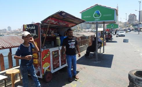 وزارة النقل والمواصلات تقوم بتنظيم عمل البسطات العشوائية داخل الميناء