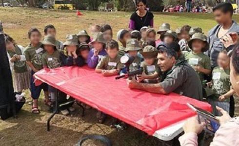 الشرطة الإسرائيلية تدرب الأطفال على السلاح-توضيحية-