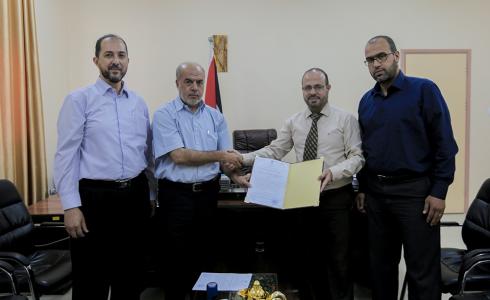المالية بغزة توقع مذكرة مع الكلية الجامعية تتعلق بأبناء الموظفين