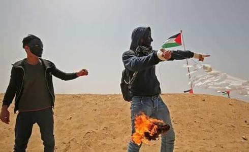 شٌبان فلسطينيون يطلقون طائرات ورقية حارقة  - إرشيفية - 