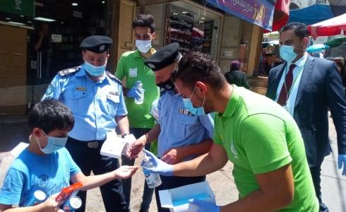 الشرطة وجوال يطلقان حملة "كمامتك أمانتك"